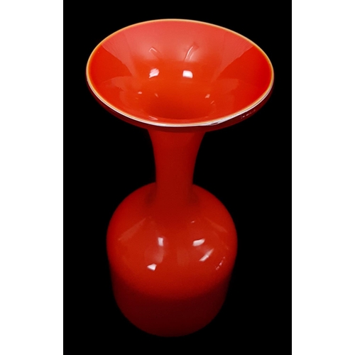 21 - An orange glass bottle vase, with flared trumpet rim, in the style of Per Lutken, 28cm approx. high