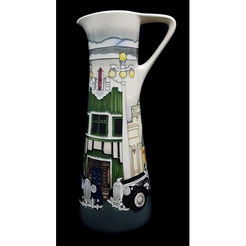 29 - Paul Hilditch for Moorcroft Pottery- A Trial JU12 shape Jug, of Napier Art Deco Cars pattern, dated ... 