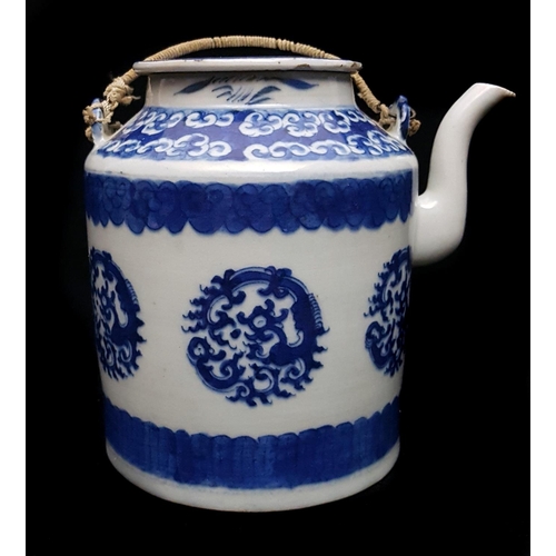 175 - A Chinese blue and white porcelain teapot and cover, decorated with roundels of stylised dragons, wi... 