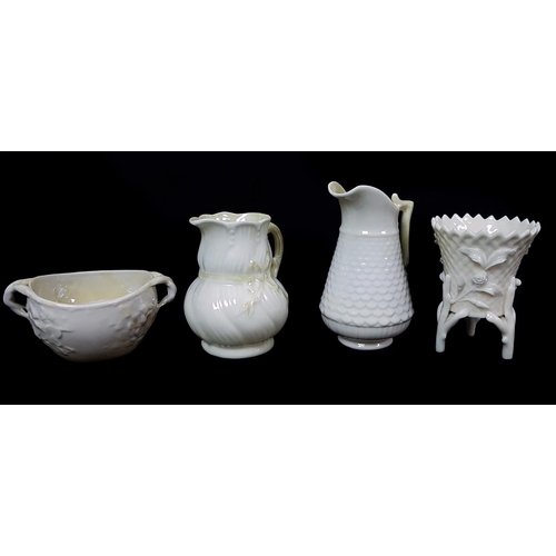 9 - Belleek Porcelain - Four items comprising a ribbon shape cream jug, yellow tint, 1st green mark 1946... 