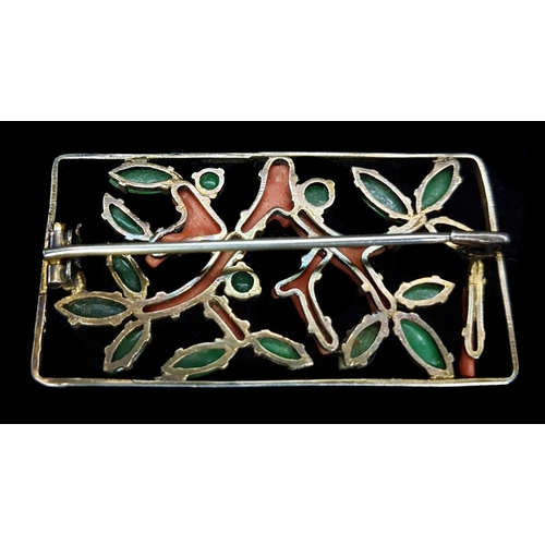 77 - An Art Deco jade and coral brooch set as leafy tree branches, in silver gilt frame, circa 1930, 5.5 ... 