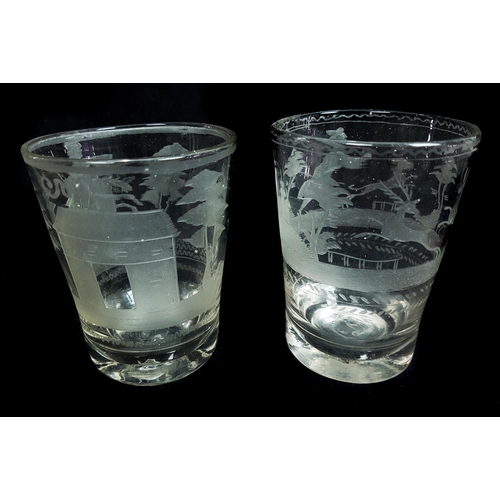 98 - Two Bohemian engraved glass tumblers, each cut with huntsmen, one on horseback and one with dogs in ... 