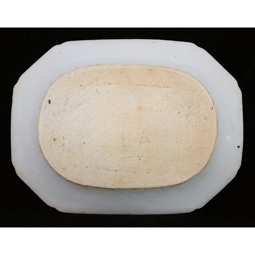 115 - A Chinese export porcelain blue and white meat plate, of shaped rectangular form, painted with a riv... 