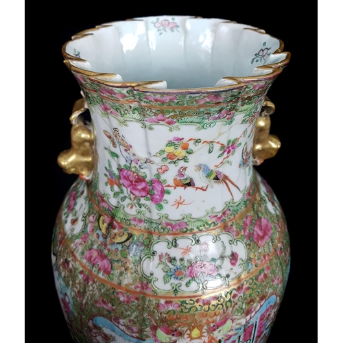 118 - A Chinese famille rose enamelled baluster vase, with linen fold upper rim, well painted with panels ... 