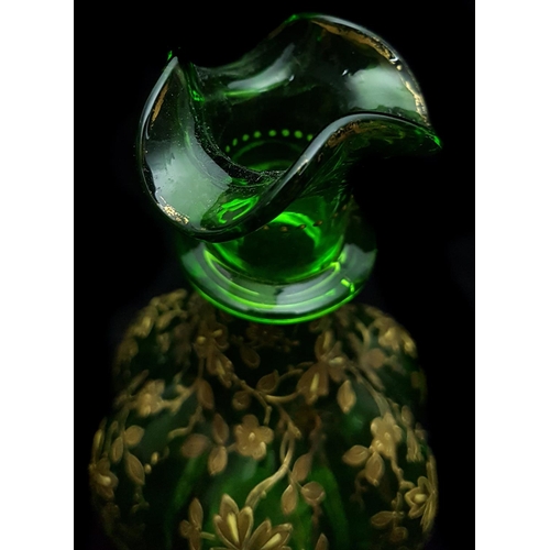 191 - Moser - An emerald green gourd form decanter and stopper, gilded with detailed prunus blossom; and t... 