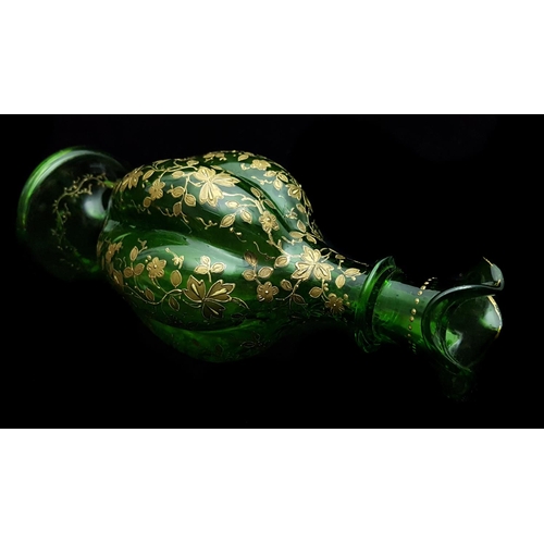 191 - Moser - An emerald green gourd form decanter and stopper, gilded with detailed prunus blossom; and t... 