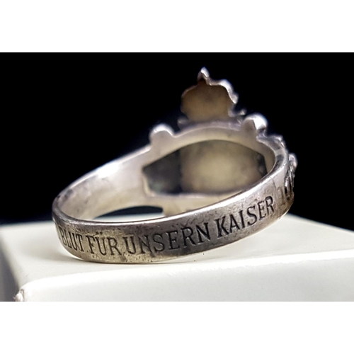 202 - A white metal Austrian Empire Kaiser shield ring, the shank inscribed GUT UND BLUT FUR UNSERN KAISER... 