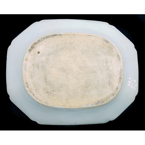 124 - A Chinese Export Blue and white porcelain meat plate, decorated with a 'Willow' type pattern within ... 