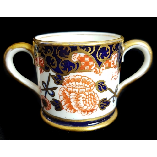 132 - A Royal Crown Derby Imari miniature loving cup, 2649 pattern; A Royal Crown Derby heart form ring bo... 