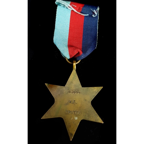 203 - Second World War Military Campaign medal - A 1939-1945 Star, with ribbon, awarded to W.E.Truter, 180... 