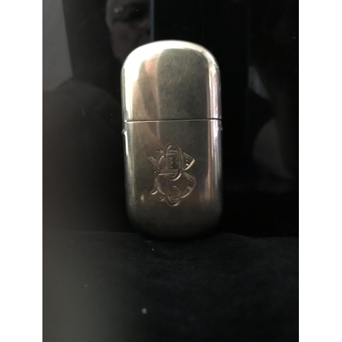 3 - A 9ct gold cigarette lighter of rounded rectangular form, engraved with PB monogramme to one side, m... 