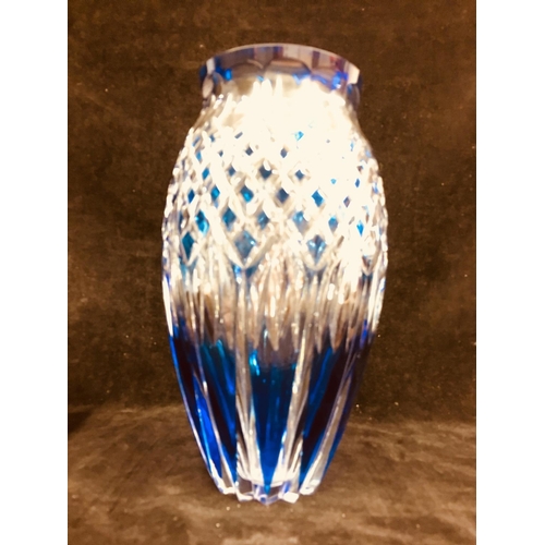 65 - Val St Lambert - A tapered ovoid glass vase, cased in royal blue and cut through to clear, engraved ... 