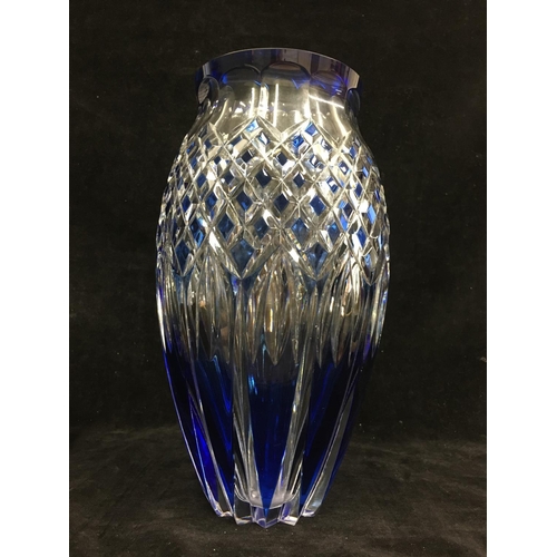 65 - Val St Lambert - A tapered ovoid glass vase, cased in royal blue and cut through to clear, engraved ... 