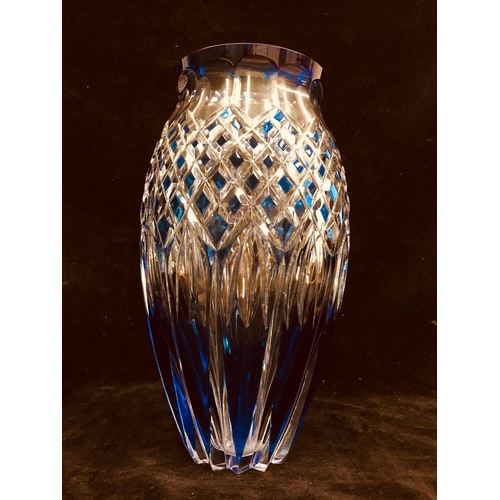 65 - Val St Lambert - A tapered ovoid glass vase, cased in royal blue and cut through to clear, engraved ... 