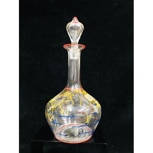 66 - A novelty decanter and stopper, the bottle form body enamelled with countries of the world with figu... 