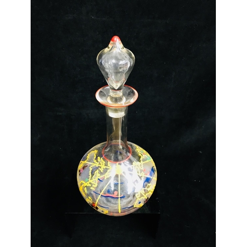 66 - A novelty decanter and stopper, the bottle form body enamelled with countries of the world with figu... 