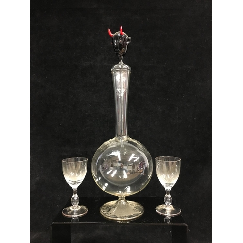 69 - A Bimini Mephistopheles decanter, the stopper formed as the Devils head in black glass with red horn... 