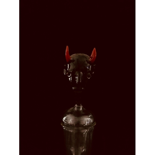 69 - A Bimini Mephistopheles decanter, the stopper formed as the Devils head in black glass with red horn... 