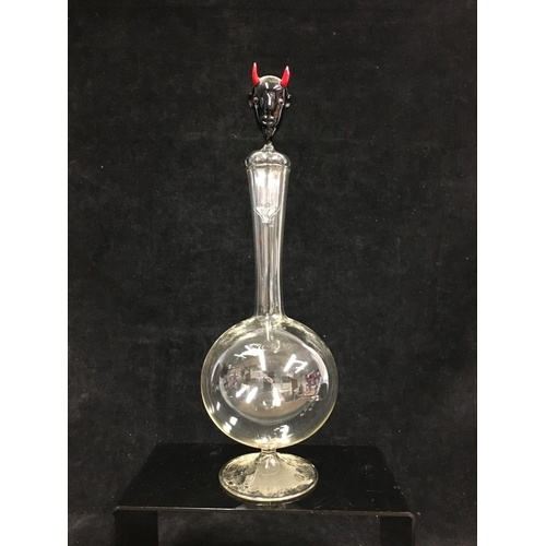 69 - A Bimini Mephistopheles decanter, the stopper formed as the Devils head in black glass with red horn... 