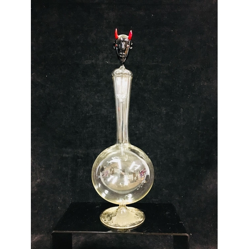 69 - A Bimini Mephistopheles decanter, the stopper formed as the Devils head in black glass with red horn... 