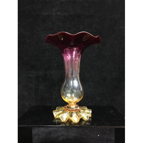 71 - A Thomas Webb Alexandrite glass vase, of flower bud form on circular frilled foot, colour graduated ... 