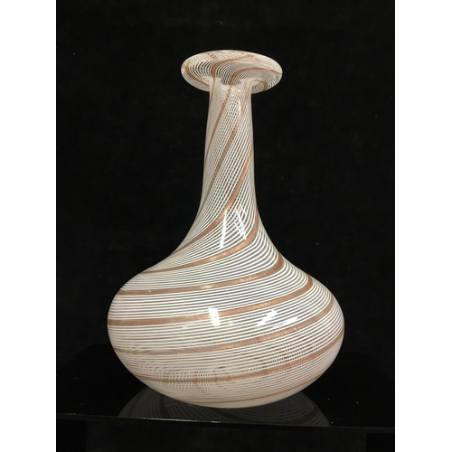 78 - Dino Martens - A glass bottle vase decorated with white and gold spiraled canes, 17cm high