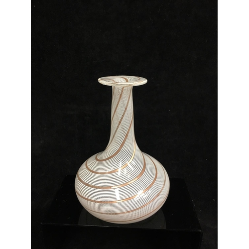 78 - Dino Martens - A glass bottle vase decorated with white and gold spiraled canes, 17cm high