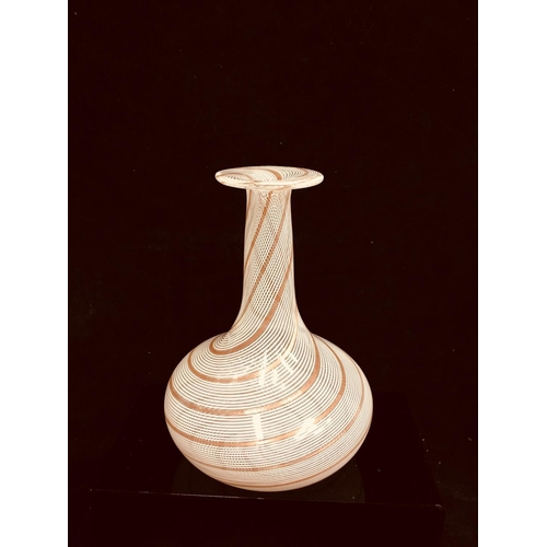 78 - Dino Martens - A glass bottle vase decorated with white and gold spiraled canes, 17cm high