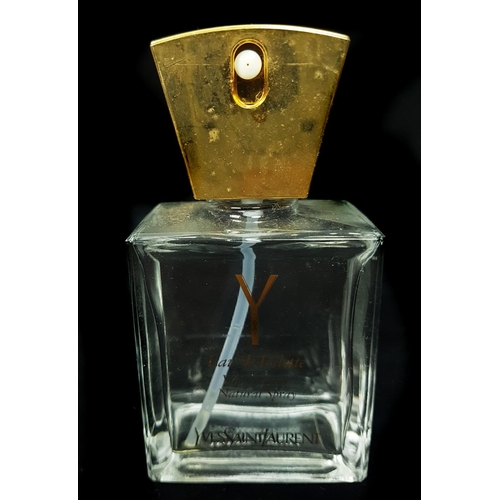 97 - A Group of Seven Commercial perfume bottles, comprising: L' Eau D' Issey - Parfums Issey Miyake, con... 