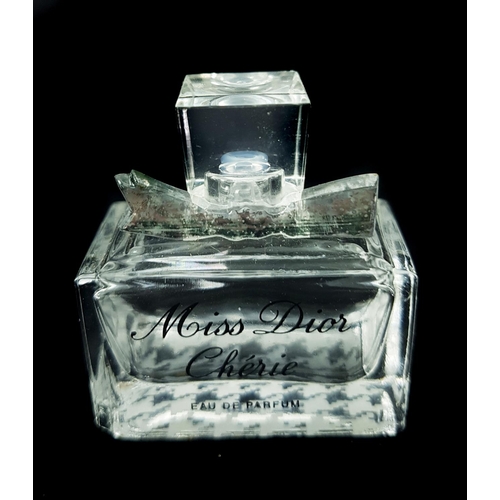 98 - Miss Dior Cherie - Two Commercial Perfume bottles comprising: Miniature rectangular with houndstook ... 