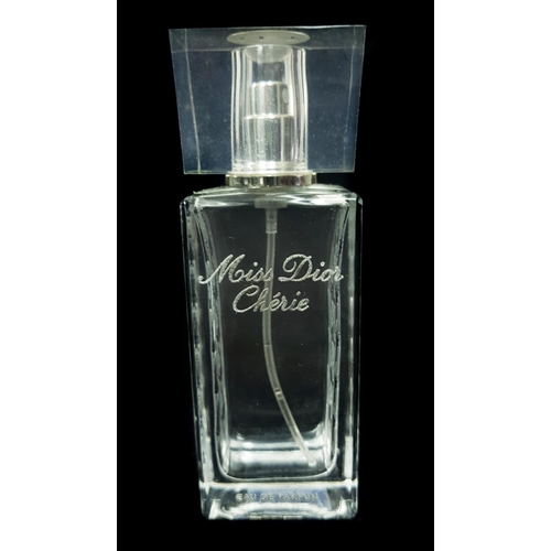 98 - Miss Dior Cherie - Two Commercial Perfume bottles comprising: Miniature rectangular with houndstook ... 