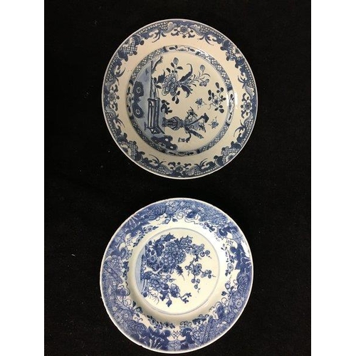 111 - Two Chinese export porcelain blue and white plates, circular, decorated with flowering peony and pru... 