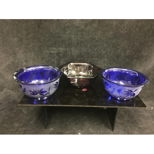 115 - Three Chinese Peking glass rice bowls, comprising a pair of cobalt blue colour etched with lotus flo... 