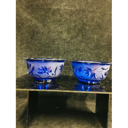 115 - Three Chinese Peking glass rice bowls, comprising a pair of cobalt blue colour etched with lotus flo... 