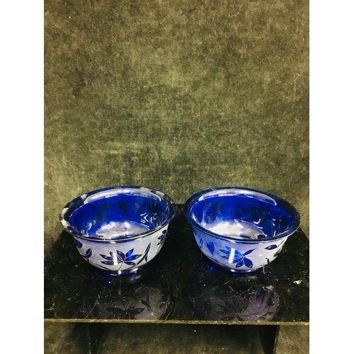 115 - Three Chinese Peking glass rice bowls, comprising a pair of cobalt blue colour etched with lotus flo... 