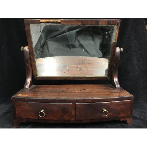 163 - A Victorian mahogany toilet mirror, the rectangular plate above two drawers with brass ring handles,... 