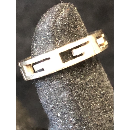 13 - Gucci - A white gold G logo unisex ring, formed as six G  openwork letters and a blank rectangle, st... 