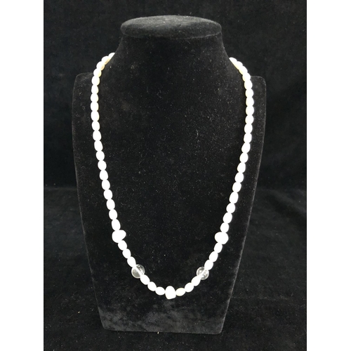 23 - A cultured freshwater pearl and rock crystal bead necklace, silver ring clasp stamped 925, 48cm long