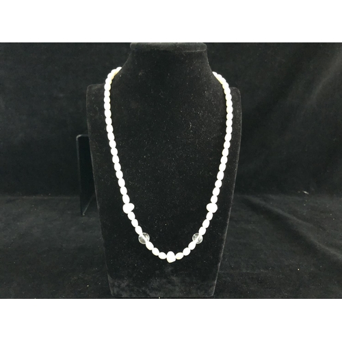 23 - A cultured freshwater pearl and rock crystal bead necklace, silver ring clasp stamped 925, 48cm long