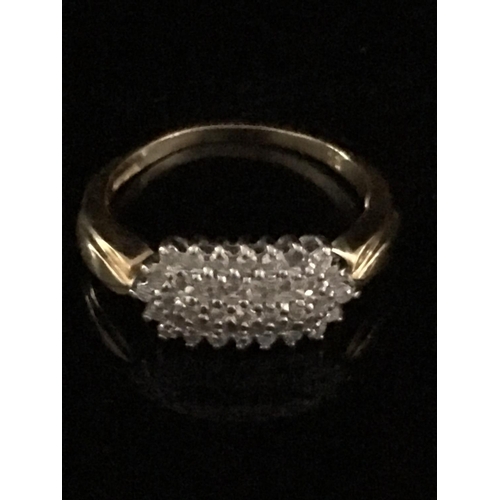 40 - An 18ct gold diamond half hoop cluster ring, set with 39 brilliant cut diamonds, 1.3mm diam approx, ... 