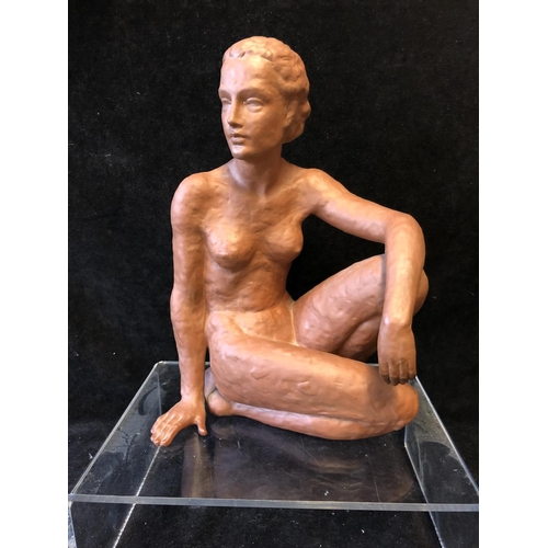 139 - An Art Deco style terracotta figure of a seated nude female, probably Austrian, impressed 12 to base... 