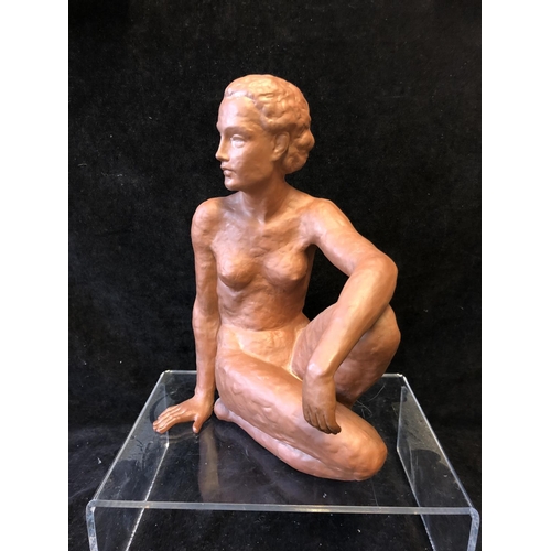 139 - An Art Deco style terracotta figure of a seated nude female, probably Austrian, impressed 12 to base... 