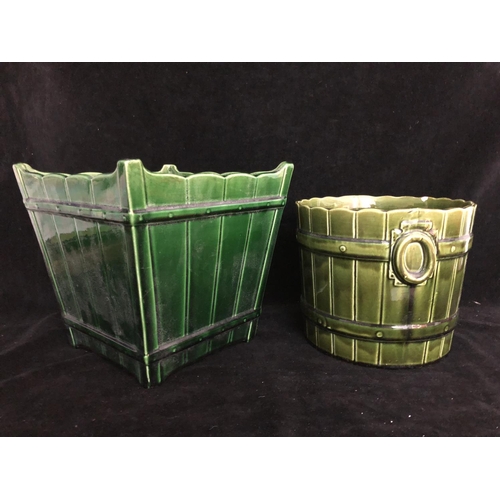 147 - Two majolica green glazed jardinieres, one by T F & Sons, of Gypsy 3 shape, barrel form with faux ri... 