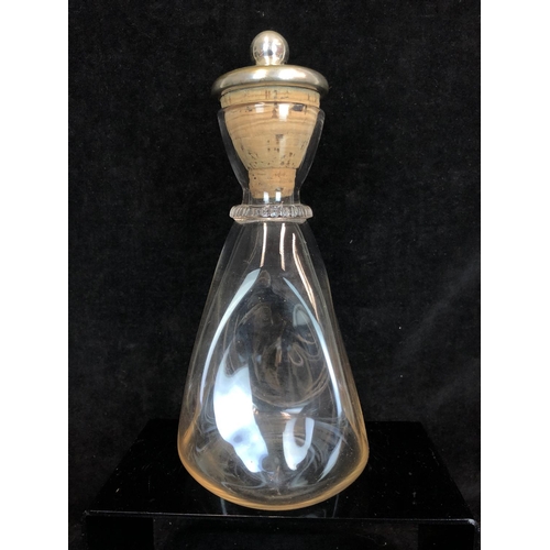 93 - James Powell & Sons, Whitefriars - A dimpled leather bottle carafe/decanter, of conical flask form w... 