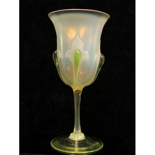 95 - Stevens and Williams - A vasaline  glass chalice, the bell form bowl decorated with fleur des lys mo... 