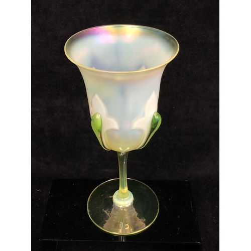 95 - Stevens and Williams - A vasaline  glass chalice, the bell form bowl decorated with fleur des lys mo... 