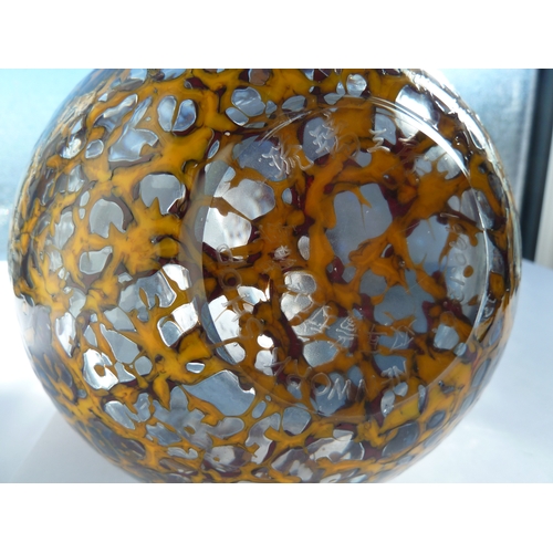 55 - Loretta Hui-shan Yang or Yang Huishan - an ovoid glass vase with surface mottling of blue and orange... 