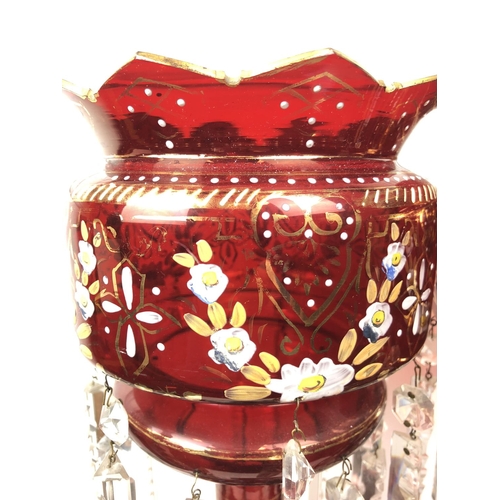 51 - Bohemian Glass - A pair of ruby glass table lustres, the bowls with crenelated rim, gilded and ename... 