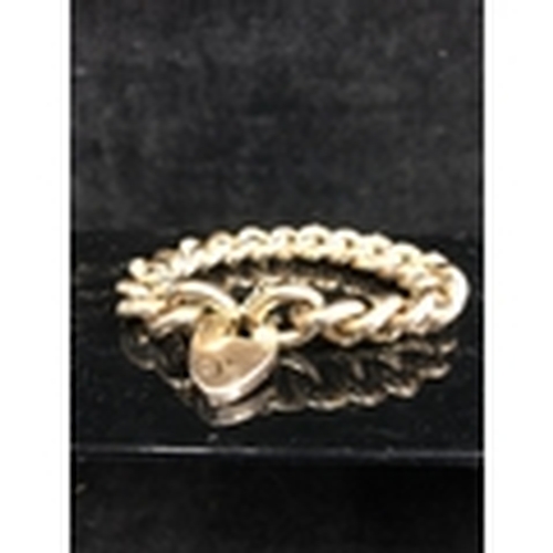 3 - An 9ct gold heavy chain link bracelet, with heart form padlock clasp, the top surface of the links e... 