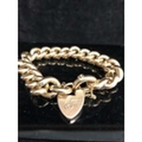 3 - An 9ct gold heavy chain link bracelet, with heart form padlock clasp, the top surface of the links e... 